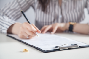 finances during divorce someone signing some paper milford ct